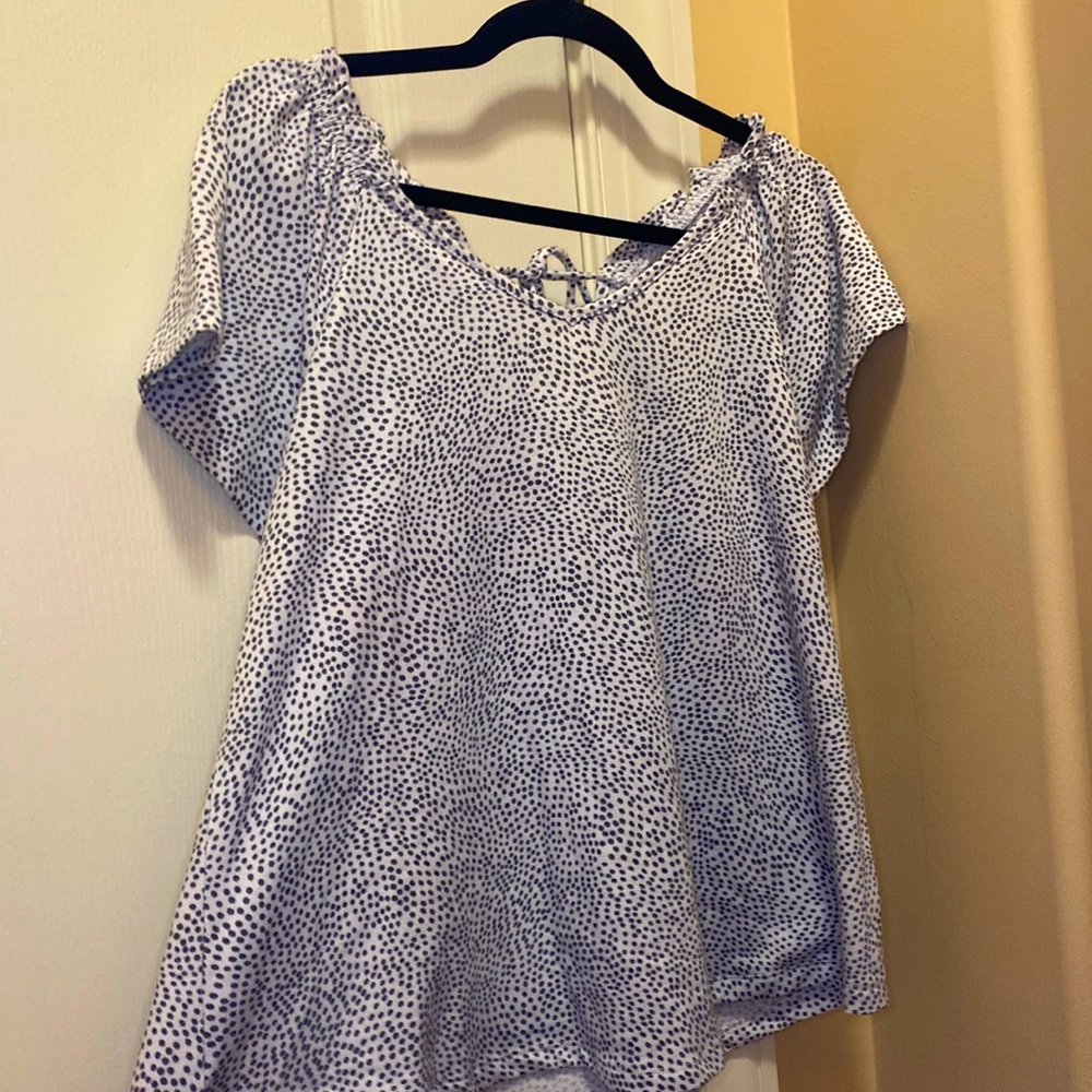 Black and White polkadot shirt that ties in the back
